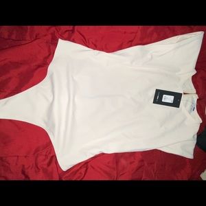 Beige shoulder pad bodysuit